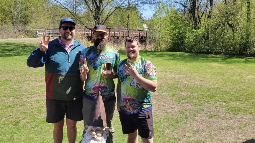 three men and a gnome